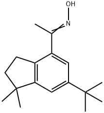 1-[6-(TERT-BUTYL)-1,1-DIMETHYL-2,3-DIHYDRO-1H-INDEN-4-YL]ETHAN-1-ONE OXIME