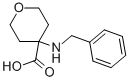 TETRAHYDRO-4-[(PHENYLMETHYL)AMINO]-2H-PYRAN-4-CARBOXYLIC ACID